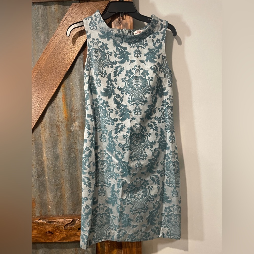 This is a beautiful knee length dress!   I always get compliments.